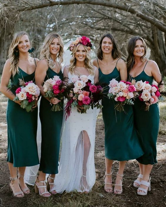 emerald green midi bridesmaid dresses with scoop necklines and nude heels are great for a fall wedding
