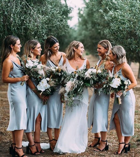 light blue slip midi bridesmaid dresses with black lace lining and front slits look very chic and sexy and will go for a spring or summer wedding