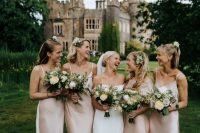pale pink slip maxi bridesmaid dresses with mermaid tails and V-necklines are amazing for a dreamy castle wedding