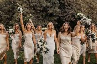 silver slip midi bridesmaid dresses with side slits and cowl necks, nude shoes for a cool summer or spring wedding