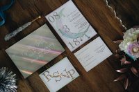 03 a holographic wedding invitation suite with a half moon is a lovely idea for a modern iridescent wedding