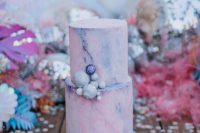 10 a jaw-dropping iridescent wedding cake done with a blue and pink marble effect and some mini disco balls is a gorgeous solution
