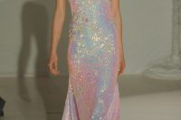 11 a holographic spaghetti strap wedding dress with a deep V-neckline is a bold statement at a wedding