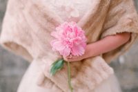 11 a single pink peony looks cute and girlish, ideal for the brides who want to look even more feminine