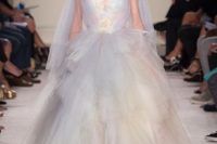 16 a jaw-dropping iridescent wedding ballgown with a layered tulel skirt and a shiny iridescent bodice plus a capelet
