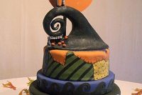 20 a colorful Nightmare Before Christmas wedding cake in bold shades is a fun idea for a themed wedding with much color