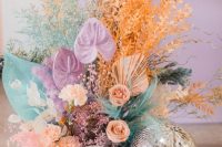 a lovely dried flowers wedding centerpiece