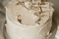 35 a neutral textural winter wedding cake topped with dried blooms is a stylsih idea not only for a winter wedding