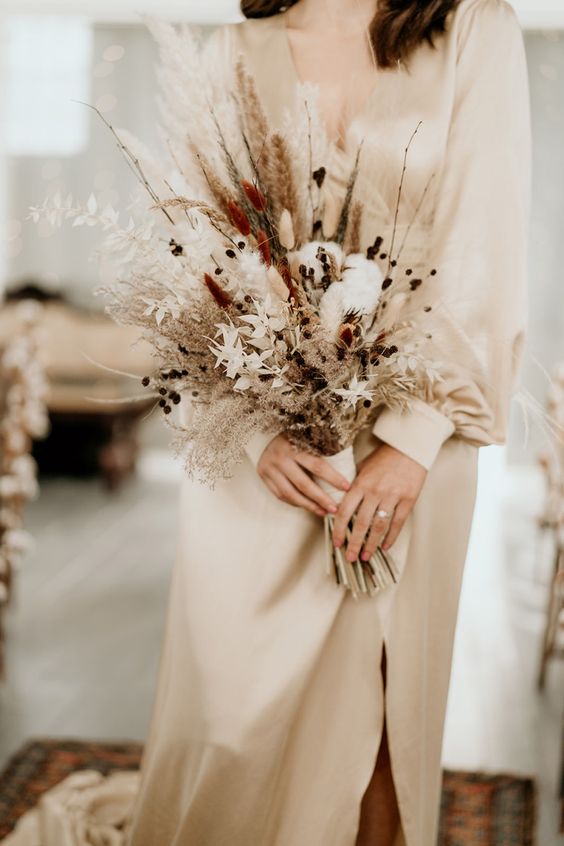 a cute dried flower wedding bouquet
