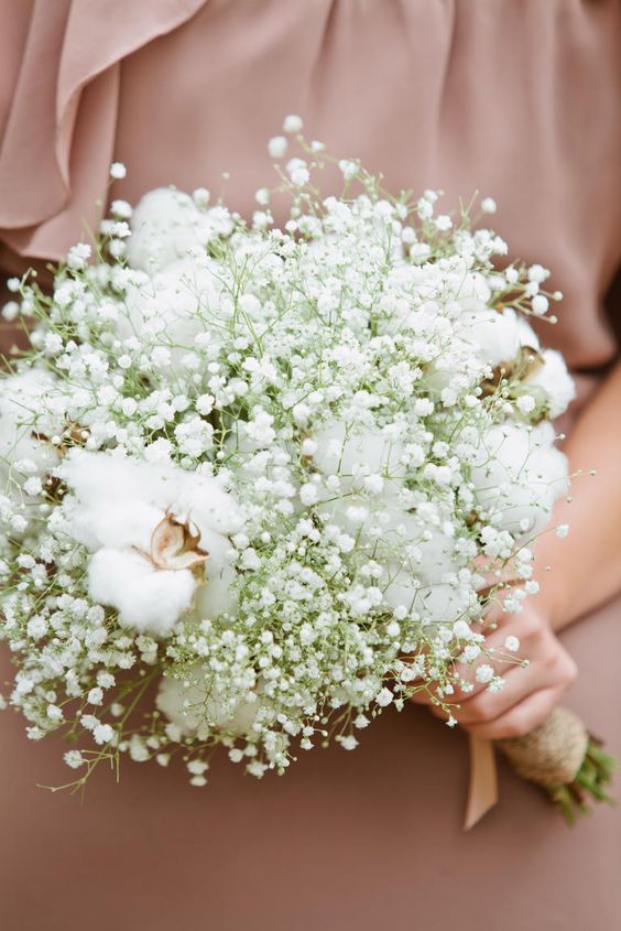 an ethereal winter wedding bouquet of baby's breath and cotton is great for a rustic wedding