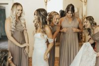 beautiful greige maxi bridesmaid dresses with draped bodices and pleated skirts are lovely for a spring, summer or fall wedding