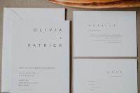 ultra-minimalist white wedding invitations with modern black lettering is a stylish solution that will show off your style at once