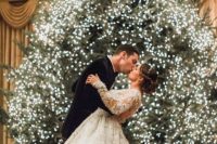 24 a large Christmas tree fully covered with lights is a perfect Christmas wedding backdrop, what can be more natural than this
