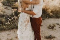 a boho bridal look with a lace applique wedding dress, a tan hat with neutral blooms and greenery is a lovely idea for a boho wedding
