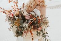 a boho bride in a tiered dress