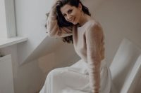 a lovely and casual winter bridal look with a beige cropped sweater, a white high waisted A-line skirt and hoop earrings, add booties and go