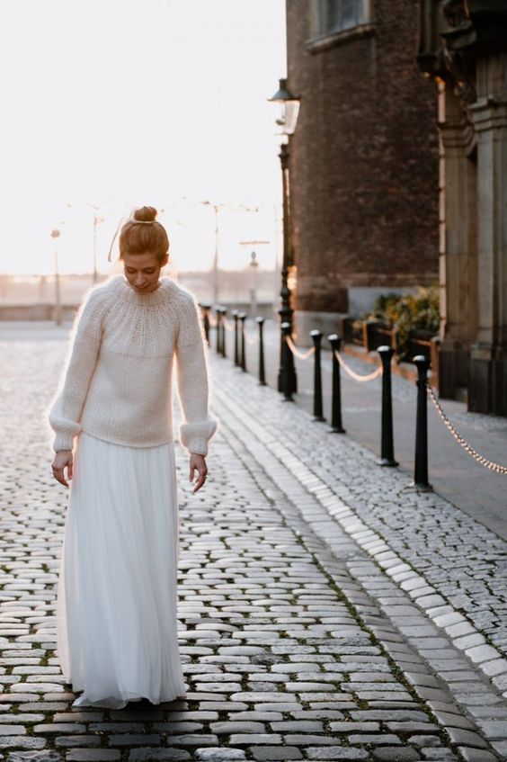 a neutral and cozy sweater, a tulle maxi skirt and a top knot for a lovely girlish wedding look with a casual and easy feel