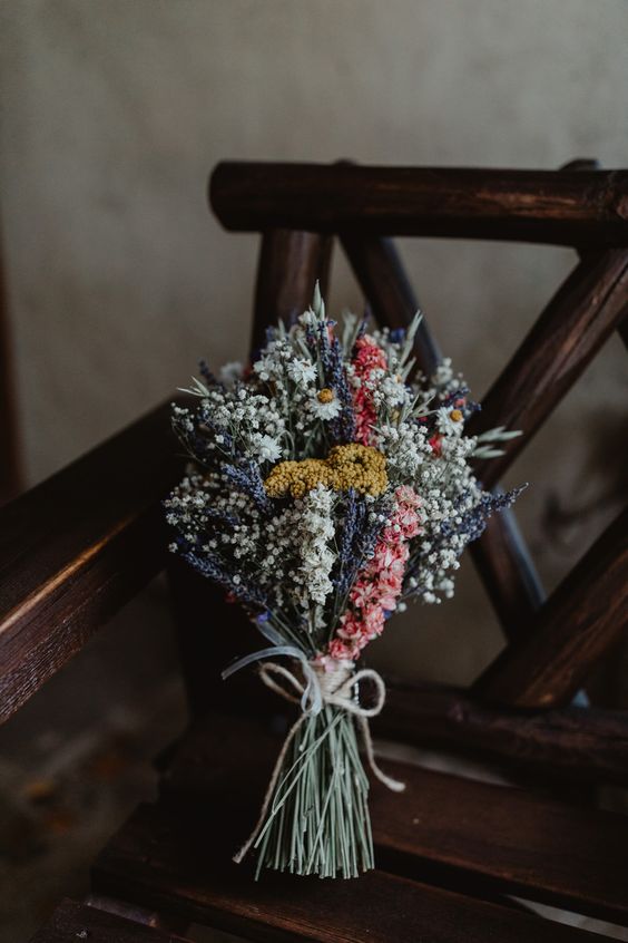 a small bohemian wedding bouquet is a cool choice