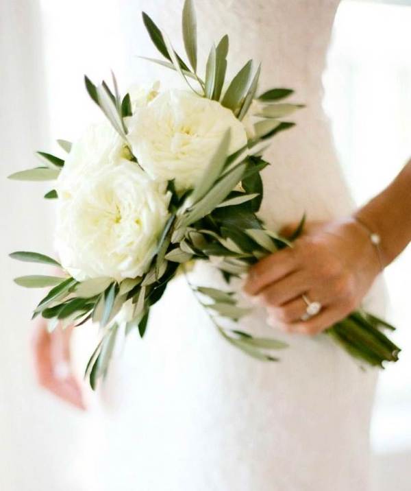 a small yet very elegant white peony rose wedding bouquet with greenery is a chic idea for most of weddings and looks fresh and cool