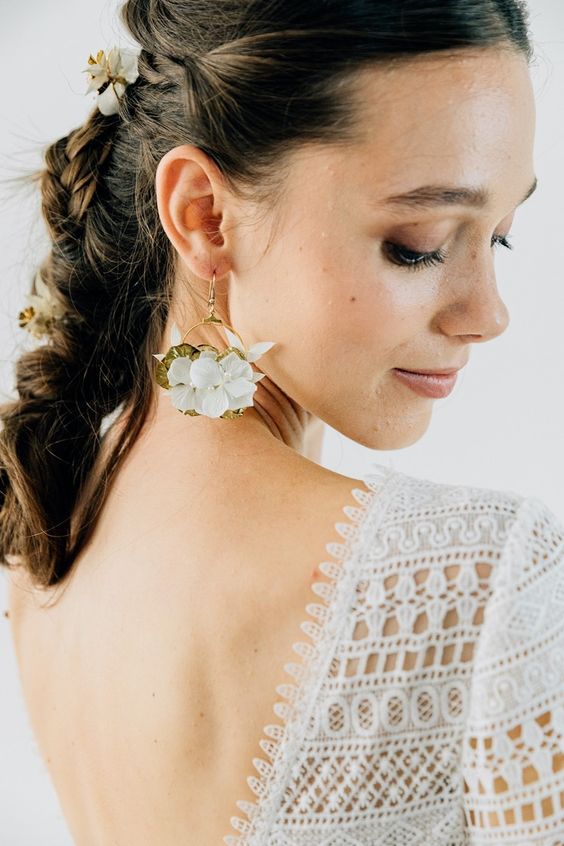 bold and catchy gold hoop and white and gold flower earrings will make your glam or even boho bridal look more special
