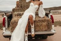 eye-catchy beige and white star print and cutout cowboy boots plus a boho wedding dress and a tan hat for pulling off a rustic bridal look