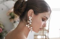 gorgeous statement flower earrings in blush and gold will make a super refined statement in your bridal look and will catch all the eyes