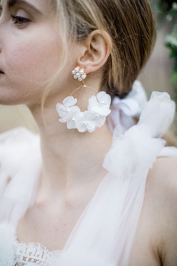 refined bridal earrings with a pearl stud, a gold hoop with white blooms and pearls are a very sophisticated idea for a girlish outfit