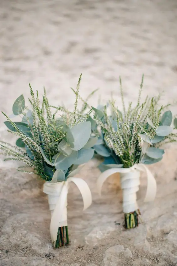simple and lovely greenery and astilbe wedding bouquets with white ribbon wraps are amazing for a spring or summer wedding