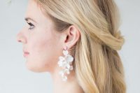 super delicate and chic white flower cascading bridal earrings are amazing to finsih off an airy and lovely birdal look