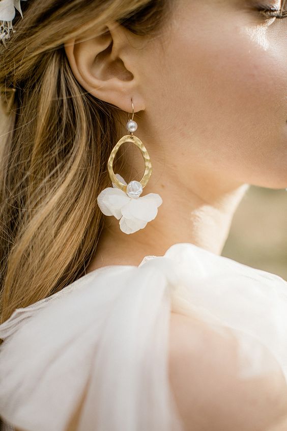 unique and refined white pearl, flower, rhinestones and gold hoop earrings are really an out of the box solution for a bride