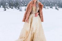 09 a gorgeous gold lace wedding dress and a pink faux fur jacket fo a dreamy and fairy-tale like bridal look