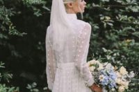 12 a 70s inspired mini lace wedding dress with a turtleneck, long sleeves and a veil is a perfect idea for a boho bride