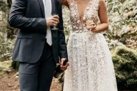 13 a gorgeous lace applique midi wedding dress with a plunging neckline and no sleeves plus nude shoes