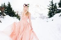 a cute pink wedding dress works for a winter wedding too