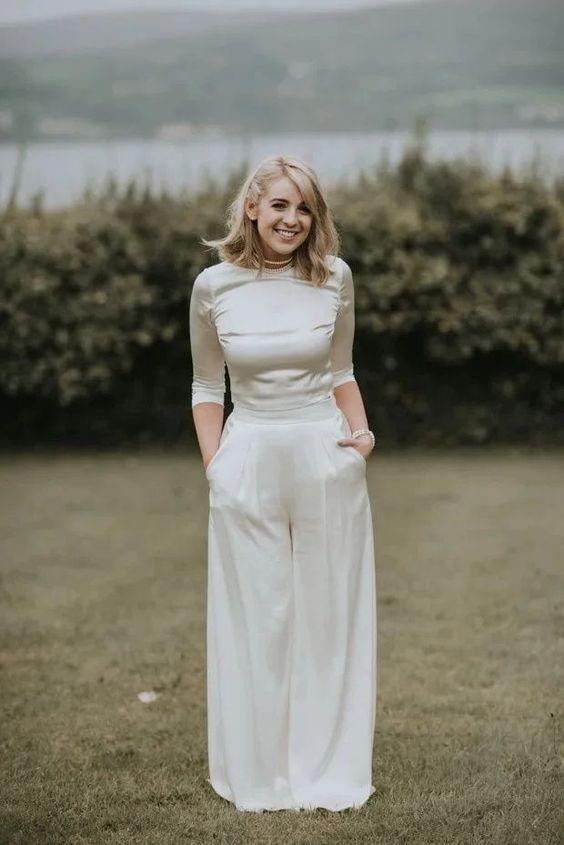 a chic wedding separate of a silk crop top with short sleeves and palazzo pants plus a choker for a wow look