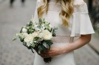 16 a retro-inspired plain wedding dress with sheer inserts, short sleeves and a high neckline for a modest and chic look