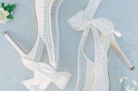 17 super delicat eand girlish white and semi sheer wedding shoes with pearls and white bows on the backs are adorable and chic