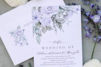 18 a delicate wedding invitation suite with hand-painted very peri blooms and greenery plus calligraphy for a delicate look