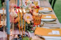 a cute colorful wedding table setting