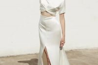21 a minimalist plain bridal separate with a silk crop top with short sleeves and an A-line maxi skirt with a front slit