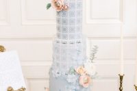 a dusty blue wedding cake