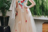 37 a tan wedding ballgown with a cutout neckline and colorful embroidery plus lace appliques for a romantic and non-typical bridal look