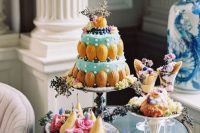 43 delicious and whimsical wedding desserts decorated with pastel blooms and fresh fruit for a Bridgerton wedding