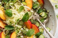 52 late summer salad with crisp fennel, juicy peaches, creamy pesto, basil and cucumbers is a refreshing and not hearty dish for a vegan wedding
