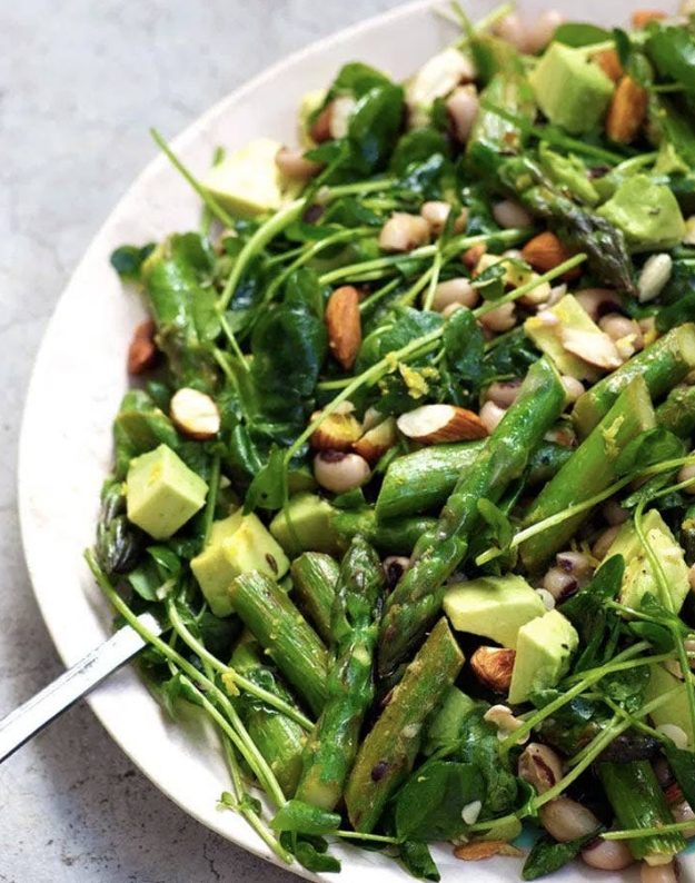 a salad of asparagus, avocado,greenery, beans and almonds is a delicious and fresh idea for a vegan wedding