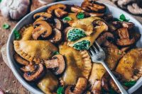 55 vegan spinach ravioli with fried mushrooms with garlic and parmesan is a hearty meal for a vegan wedding