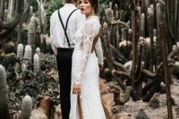 a sexy lace sheath wedding dress with a turtleneck, a side slit and a cutout back plus long sleeves