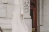 65 a turtleneck lace sheath wedding dress with long sleeves and a train for a modern and modest bride