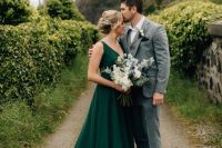 a beautiful green A-line wedding dress with thick straps, a deep V-neckline, a pleated skirt with a train is a gorgeous idea to rock