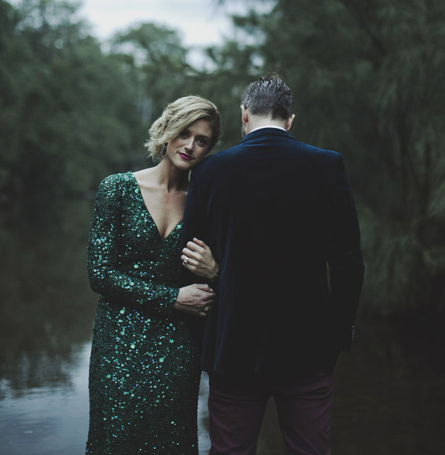 a beautiful green fully embellished A-line wedding dress with a V-neckline and long sleeves is a lovely idea for a forest bride